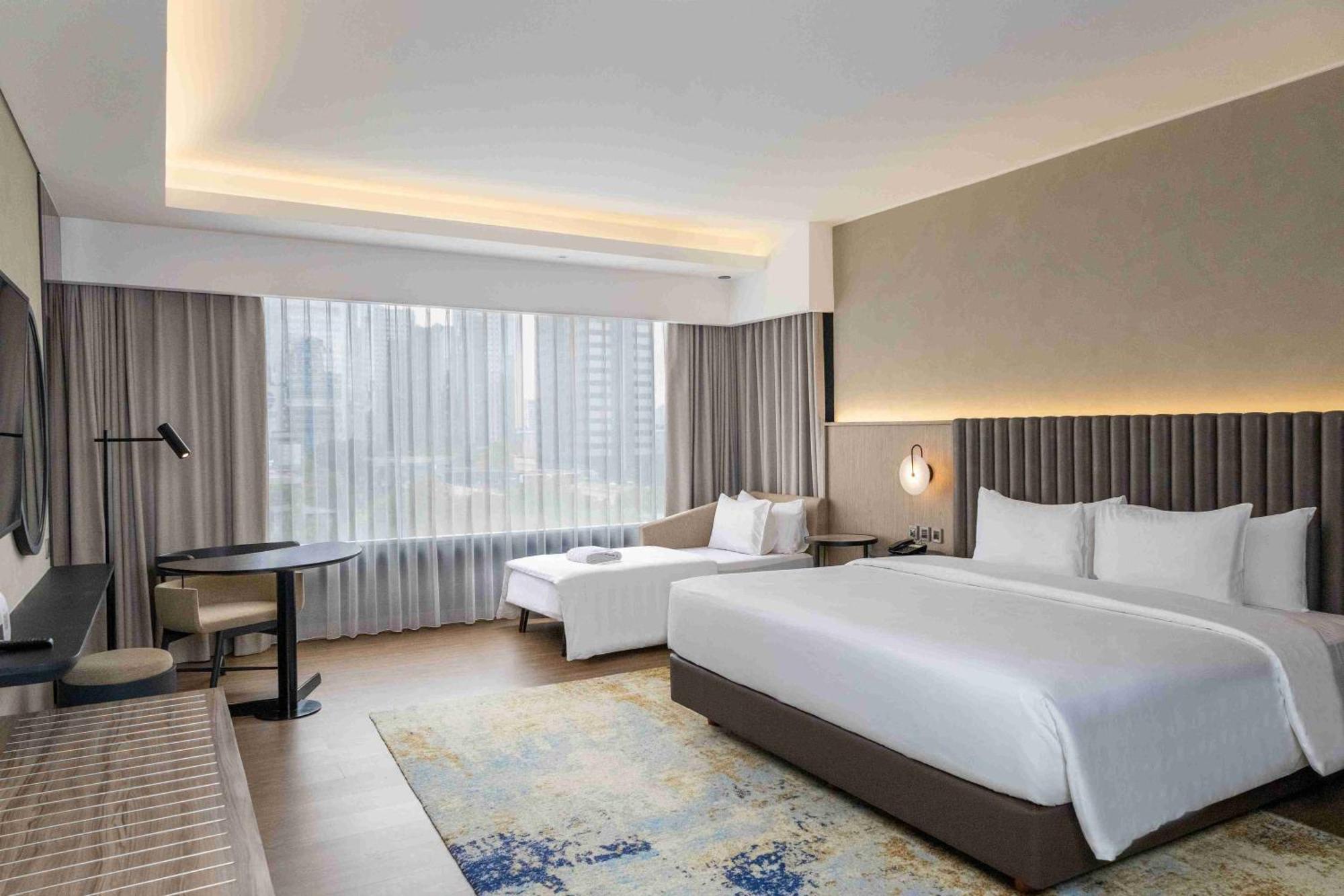 Mangkuluhur Artotel Suites Джакарта Экстерьер фото